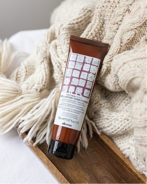 Ущільнюючий кондиціонер для волосся Davines Replumping Conditioner 150 ml 001869 фото